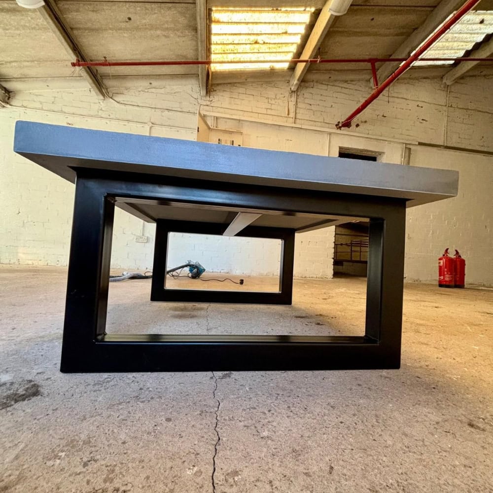 Solid Metal Square Base Legs On Textured Concrete Coffee Table